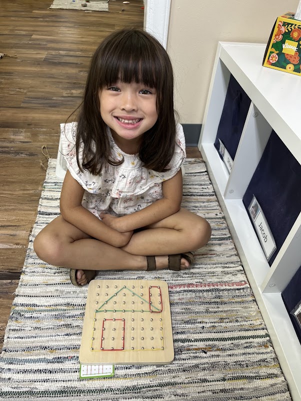 Montessori STEAM program girl developing math skills with fun project