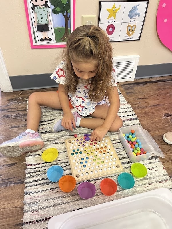 Preschool child working on steam activity